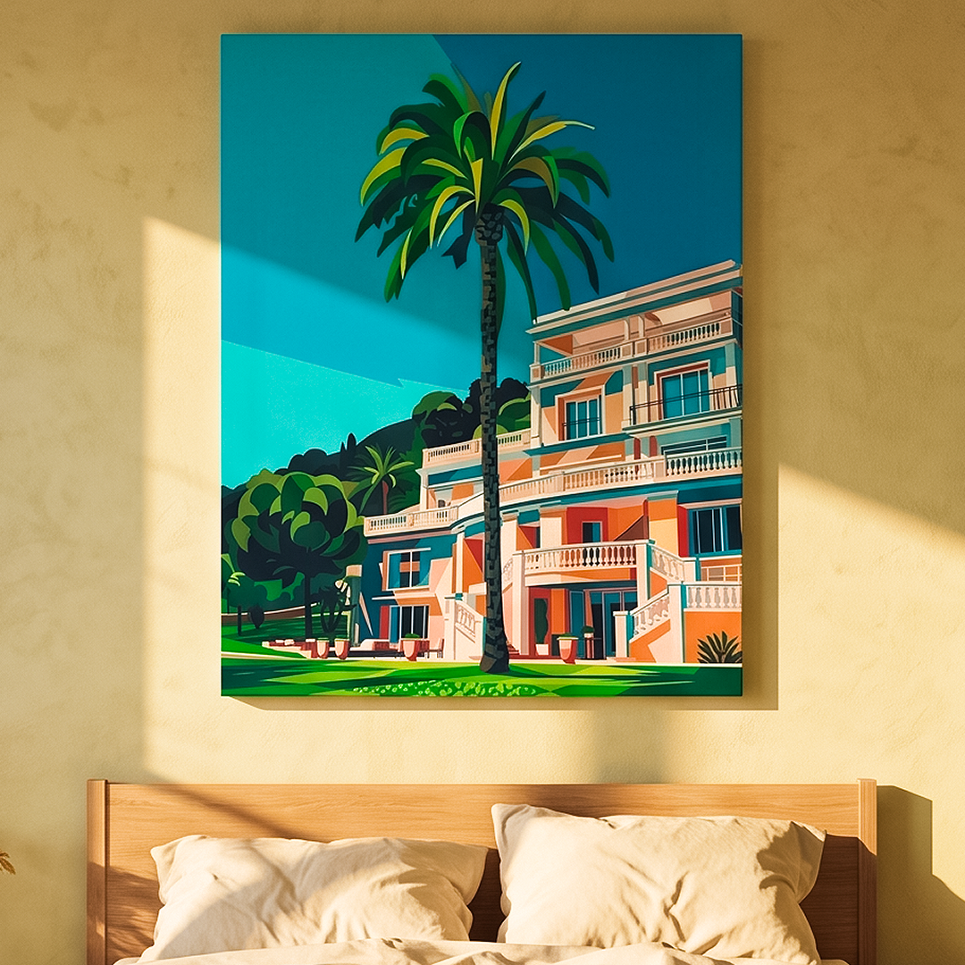 A colorful canvas wall art print depicting a tropical resort scene with a palm tree and a building, displayed on a beige wall above a bed with cream bedding.